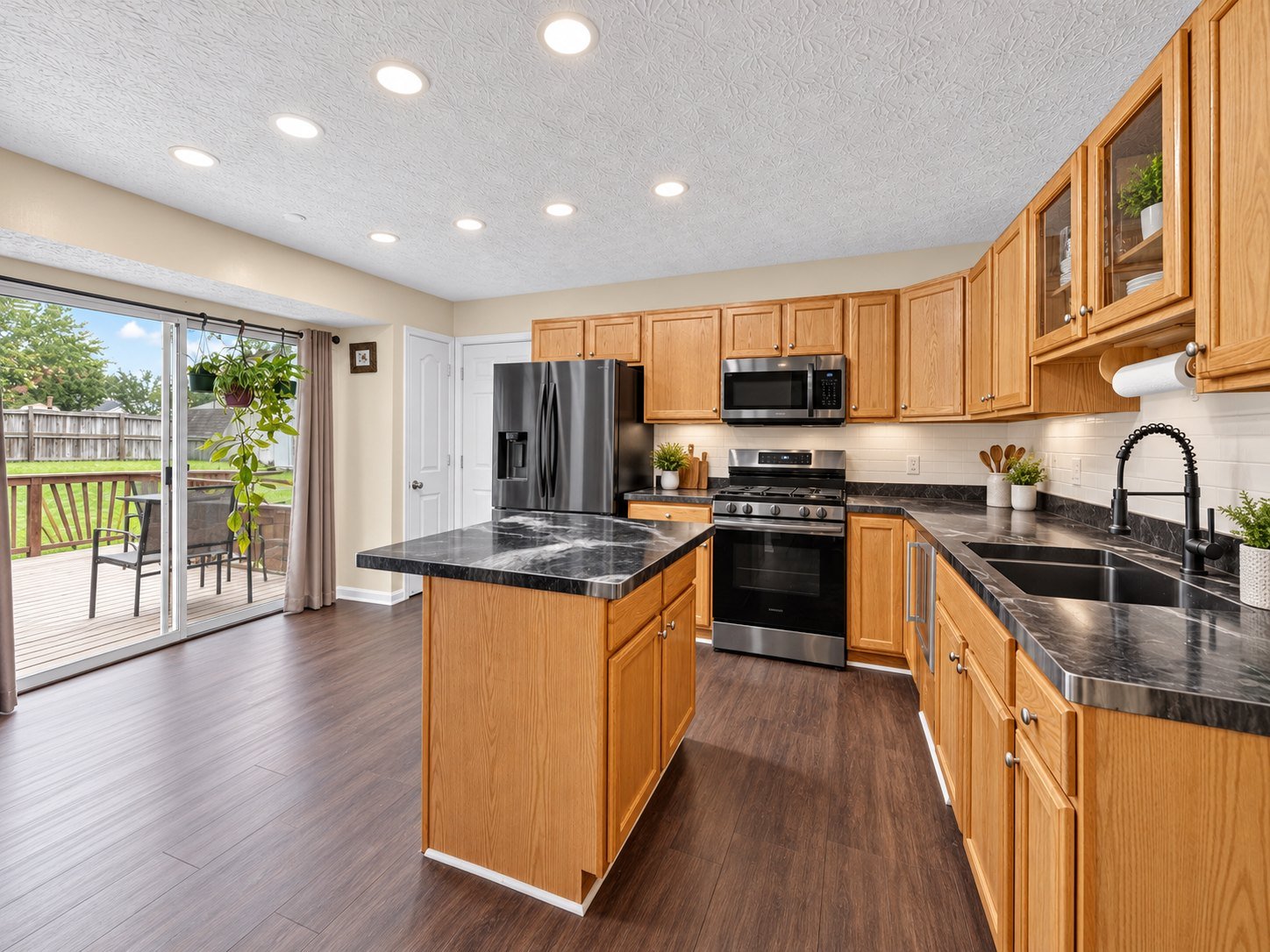 Kitchen with patio and deck access